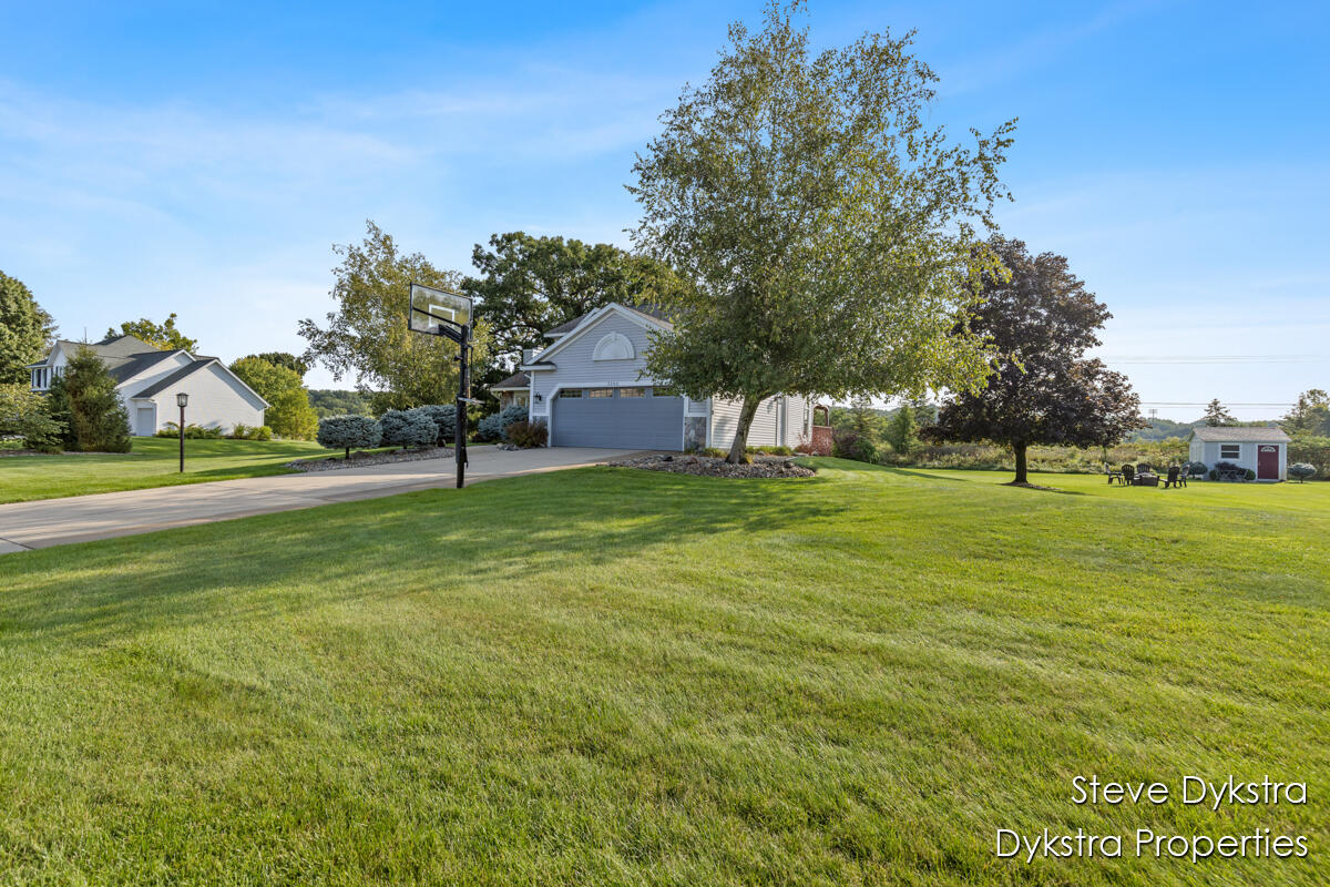 Homes for sale in Ada, MI | 2265 Grand Valley Dr, Ada, MI 49301 | MLS# 70493210