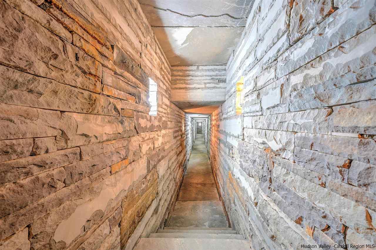 200-foot tunnel connecting main house to additional structure.