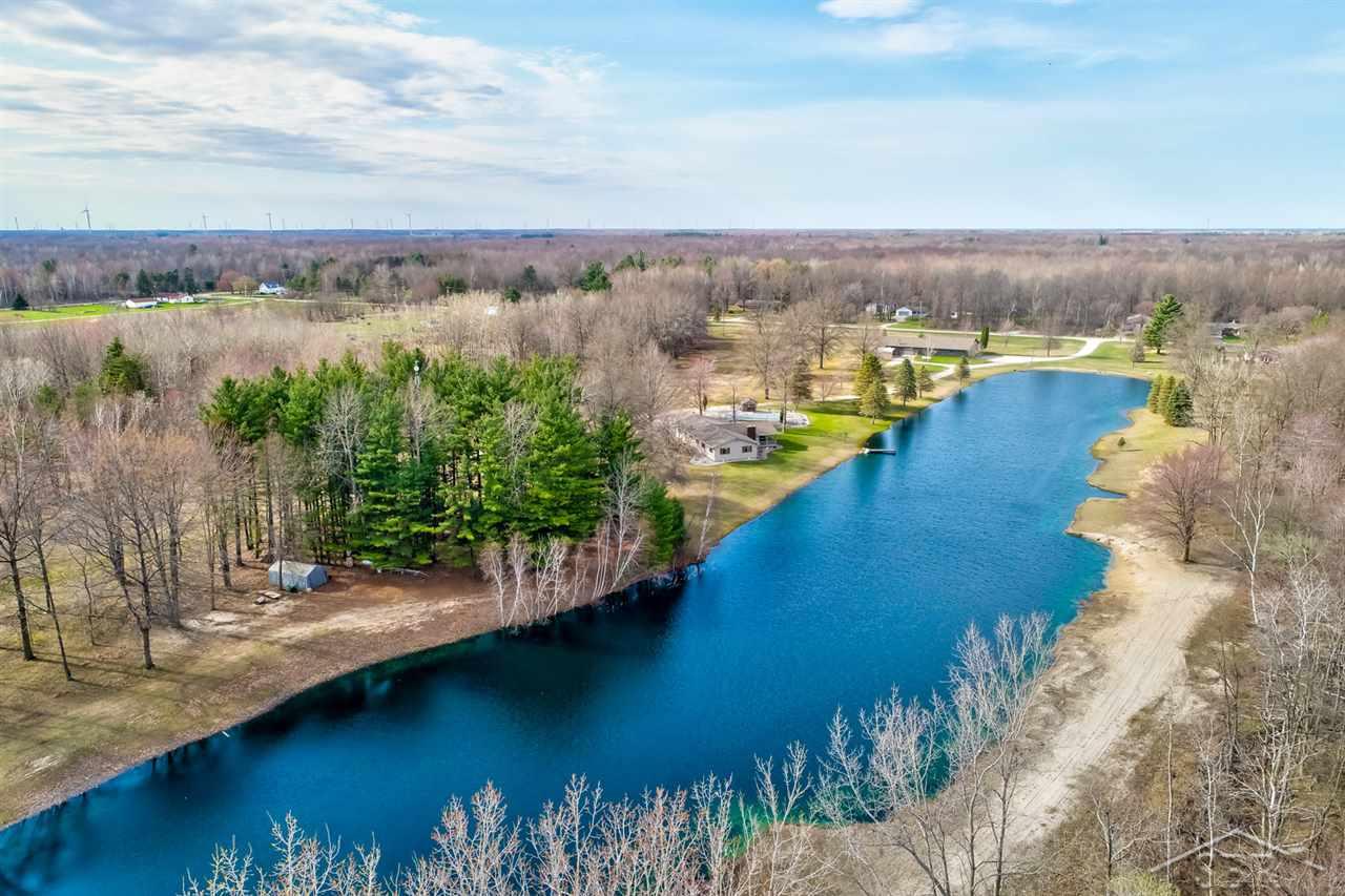 21699 SWAN CREEK RD., MERRILL, MI 48637