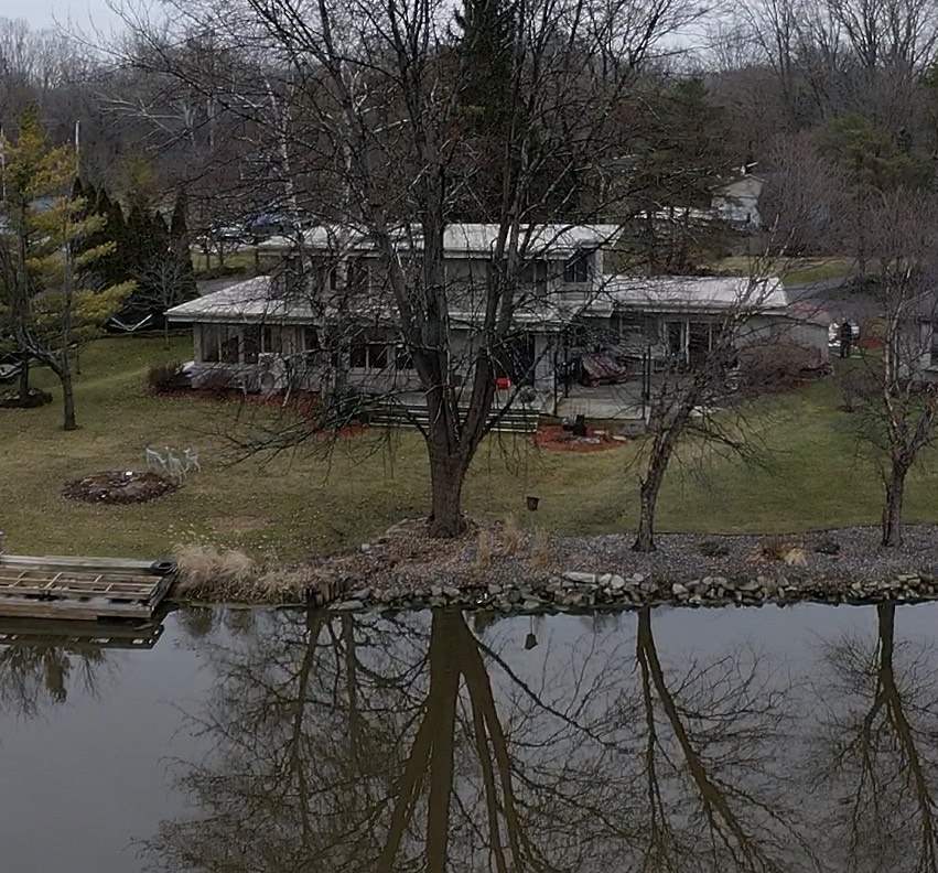 3717 KAWKAWLIN RIVER DR., BAY CITY, MI 48706