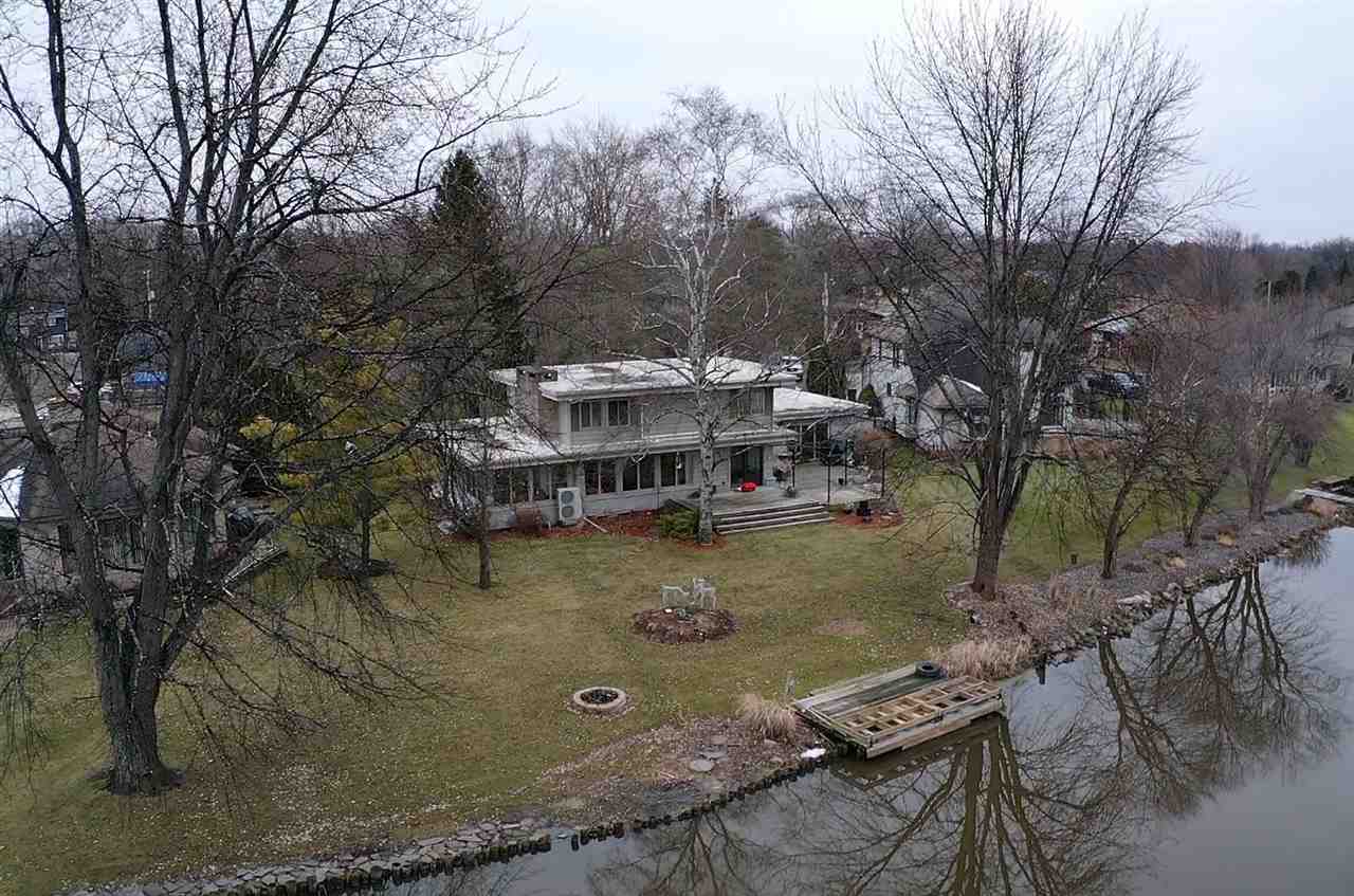 3717 KAWKAWLIN RIVER DR., BAY CITY, MI 48706