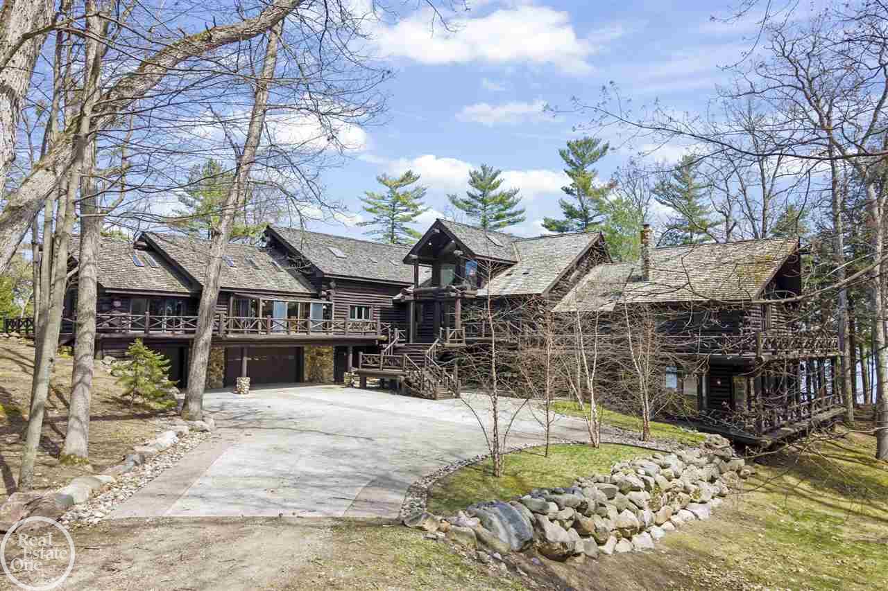 This is a rare find!  Almost 176 acre private estate with approximately 3,500' of frontage on the All Sports Lakeville Lake.  Red Tail Lodge is a custom built home featuring over 12,000 sq. ft. of finished living area on one of the gorgeous peninsulas of Lakeville Lake; this could be used as an incredible family compound or just continue to utilize as a private estate; the home sits over 1/2 mile off the road through the woods; walk-around deck surrounding the entire home overlooking lake & the private wooded grounds, soaring ceilings in the great room & master suite, 3-story stone fireplace, incredible views from the walls of windows, awesome finished lower level walkout with wet bar; guest house right on the lake and entire home has planked hardwood flooring.  No sign on property.