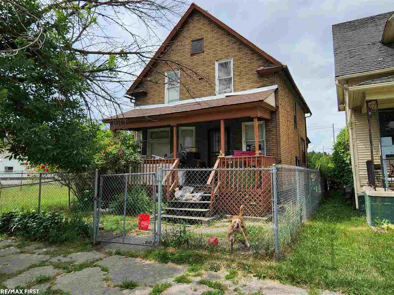 Near Downtown and Hamtramck. Seller has Many listings in this area. Possible Redevelopment? No Inside Showings. House is completely packed with Hoarders' Collection. Will need MANY DUMPSTERS to clear it out. Cash Only. Zoned Commercial.