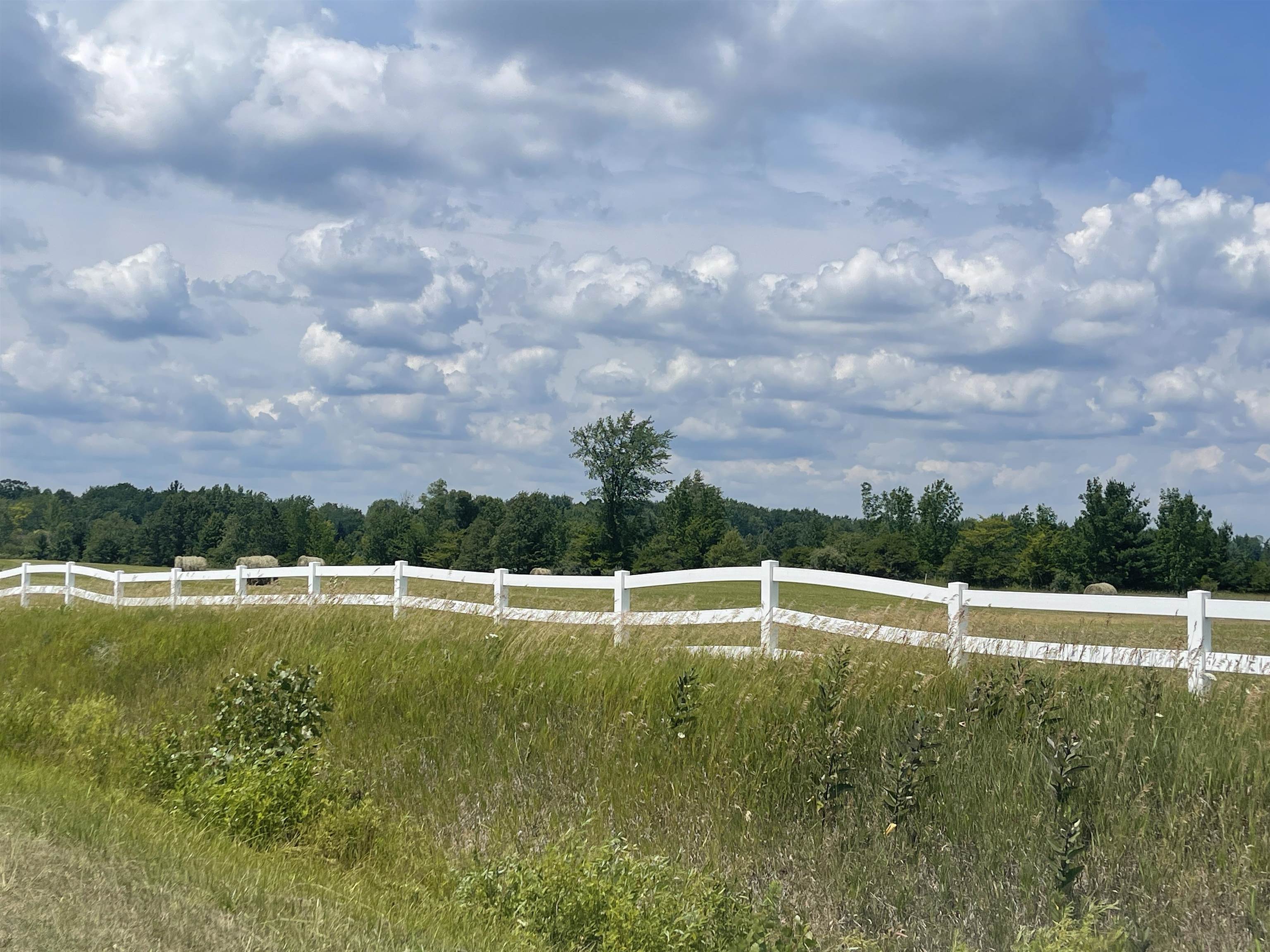 9.44 Acres with a lot of potential.  Includes approval for 4'x20' ft dock which can be put on inlet between Lots 9 and 10 for Lake Lancer access.  Electric and sewer available at road.  Perfect for  building.  Restrictions allow one pole barn 5000 SF or two pole barns at 2500 SF each. Property can be split once after purchase. A Bonus lot, which can be purchase separately (2045 Heather Way) backs up to Lot 1 giving you membership rights to Sugar Springs and its amenities.  Lot 1 is on North Side of Willow Bay along white fencing.