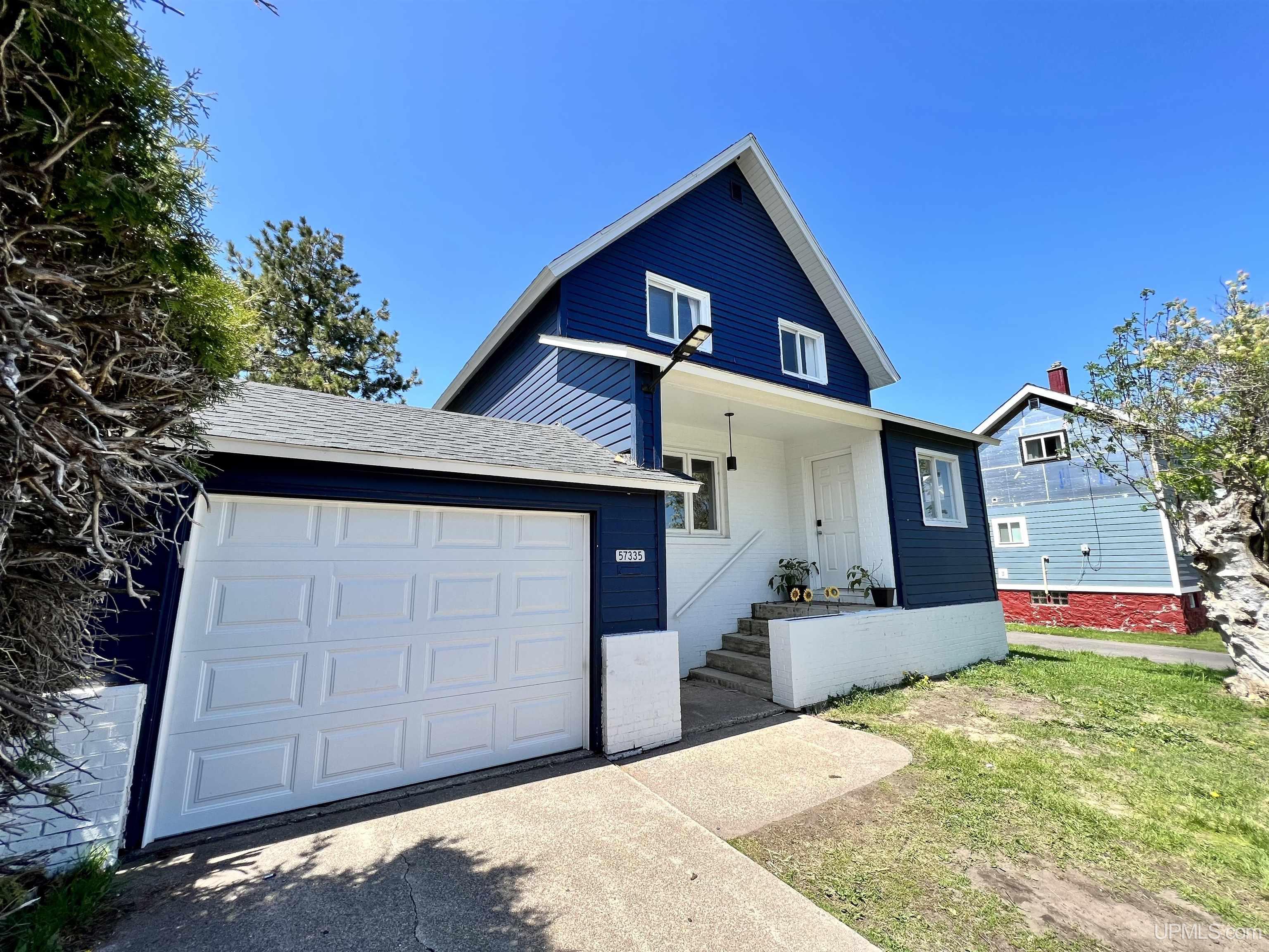 This is a conventional 2 story home located in the heart of Calumet. It is in close proximity to the school, local shops, snowmobile/ATV trails, Swedetown recreational park, and a 10 +/- minute drive to the beach.  In the last couple of years this home has been renovated from top to bottom. Some of the improvements include: a complete reconfiguration of the living room and kitchen, new cabinets, countertops, flooring, lighting. The main floor bathroom has been remodeled and laundry facilities added. A new roof was added, new furnace installed, new water heater, new plumbing, natural gas hookup and the list goes on... As you enter this home, there is a little mud room that leads you to the front of the home. This is a large and open living area. Keep going and you will be led to the huge kitchen. There is a lot of cabinet room for storage. You will find a full bathroom and laundry off the kitchen. There is a small deck area off the kitchen as well for outdoor entertainment. On the second floor you will find 3 bedrooms and a full bathroom. The yard is nice and open and feels very private. Closing to happen on July 16th,2023 or later.