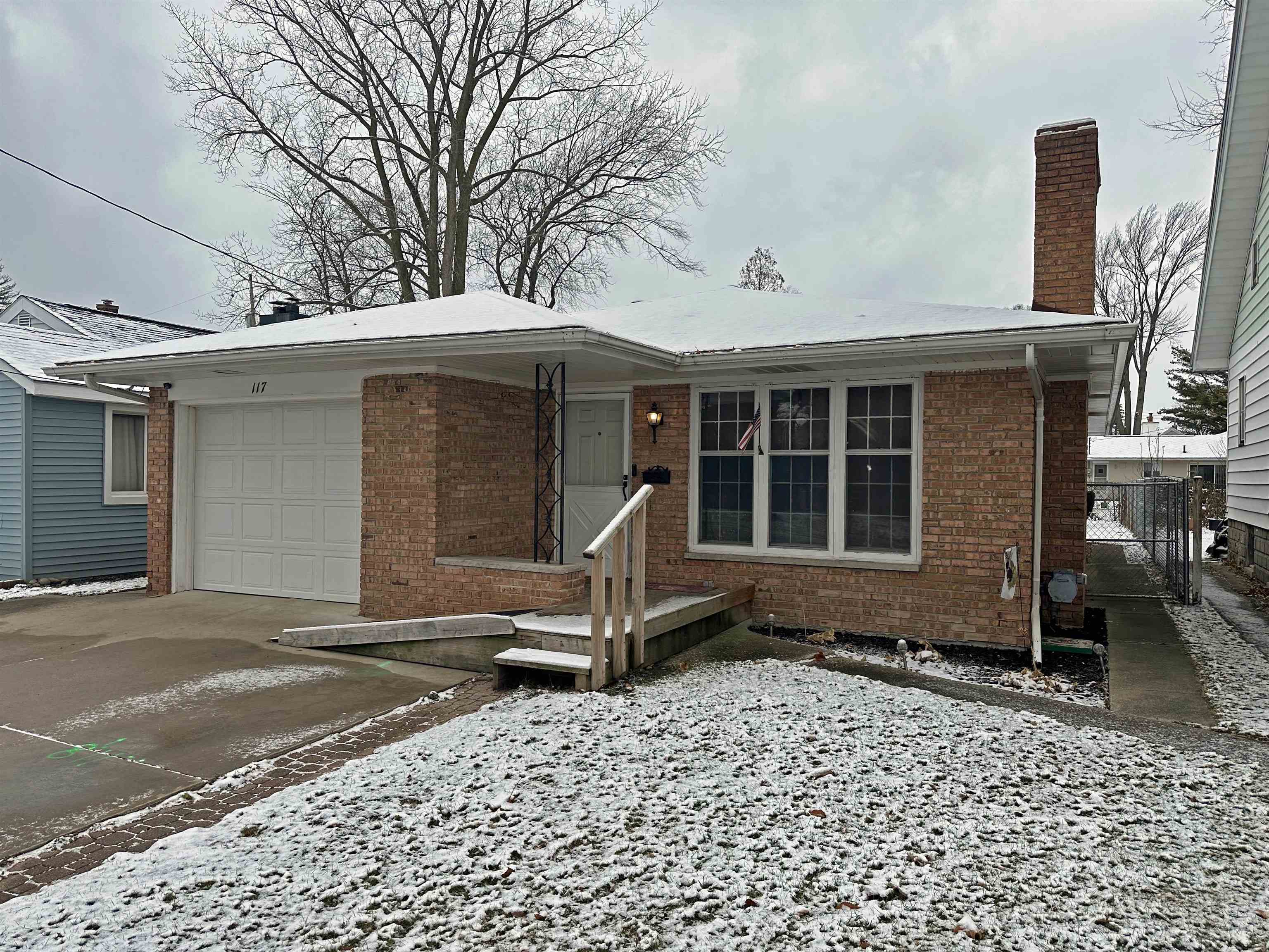 Snow Avenue between Adams Blvd and Court St.  This adorable brick ranch has everything you've been looking for and more.  2 spacious bedrooms (possible 3rd bedroom in basement), plenty of closet space, huge living room/dining room area, full basement with finished family room and large laundry area, gorgeous hardwood floors, exposed brick fireplace, wood stove insert, attached garage, high efficiency heat pump system, and much more!!!  Call for your private showing today.