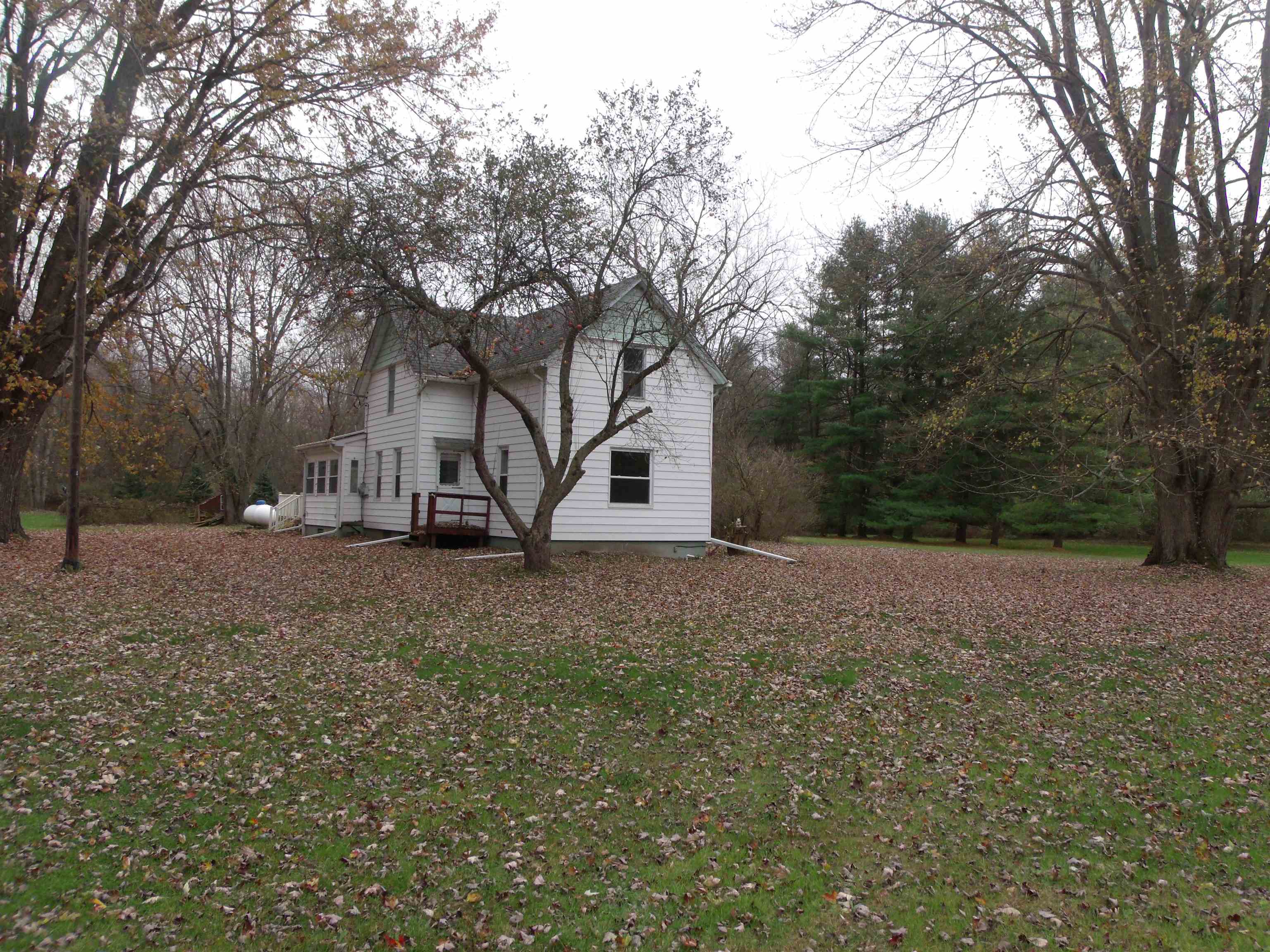 This amazing opportunity 3 bed 1 bath farm house is ready for your country touches to make it your own, sitting on 3 beautiful acres with pond, and sits back off the road so plenty of deer come through the property for the apple trees. New furnace in 2023, newer roof, siding and windows all in 2013, new block foundation. Back deck and 2 sun-rooms to watch all the wild life.With a shed and a Kennel or Chicken coop. Home just had a BANK APPRAISAL  sq ft is from that appraisal. Home being sold as is.