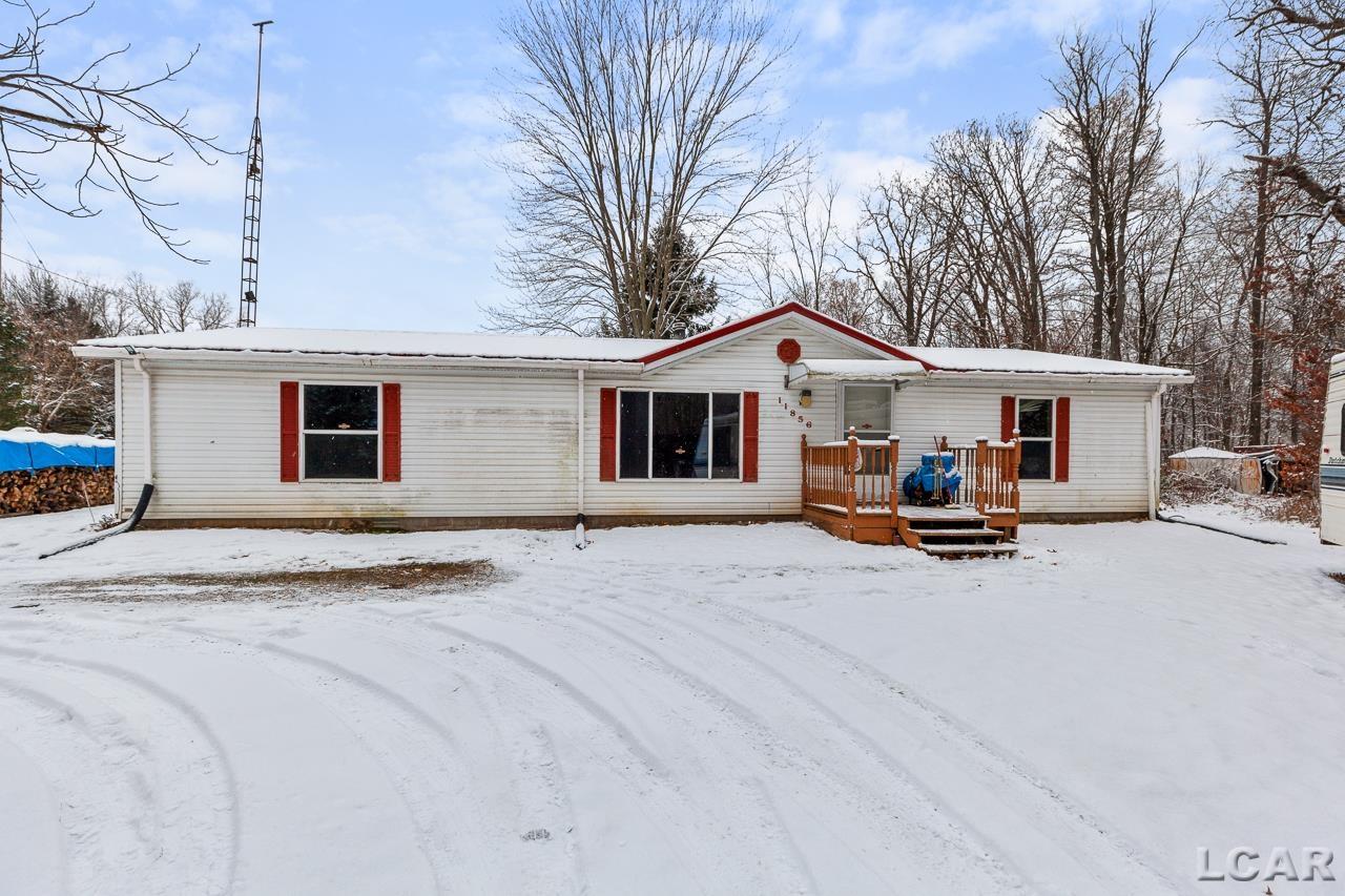 Come check out this 3 bedroom, 2 full bathroom home. Sits on over 13 acres in Brooklyn Michigan close to Michigan International Speedways. Pole Barn dimensions is 40 feet by 30 feet and has electricity. Schedule your showing today!