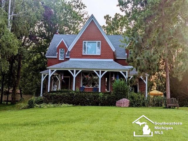 BEAUTIFUL, PICTURESQUE VIEW OF DOWNTOWN SKYLINE AND THE NEW GORDIE HOWE BRIDGE.  THIS HISTORIC WATERFRONT PROPERTY IS A MUST SEE!   BUILT IN 1893, THIS HOME IS FILLED WITH A LOT OF OLD TIME CHARM.  SPACIOUS ROOMS WITH LOTS OF STORAGE SPACE. EXTRA LARGE FAMILY ROOM WITH NATURAL WOODBURNING FIREPLACE WITH A HEATILATOR INSERT, PLUS A WET BAR, AND SLIDING DOOR WALL TO THE PORCH OVERLOOKING THE WATER.  LARGE LIVING ROOM WITH SCENIC VIEW OF THE RIVER. SPACIOUS KITCHEN WITH SLIDING DOOR WALL TO FRONT PORCH. 3 SPACIOUS BEDROOMS, MASTER BEDROOM HAS LARGE CEDAR CLOSET. BEAUTIFUL BATHROOM WITH JETTED TUB, BIDET, STANDING   SHOWER, SKYLIGHT & DOUBLE SINK.  BOAT DOCK WITH 3 SLIPS. BASEMENT HAS BEEN WATERPROOFED WITH A FRENCH DRAIN.