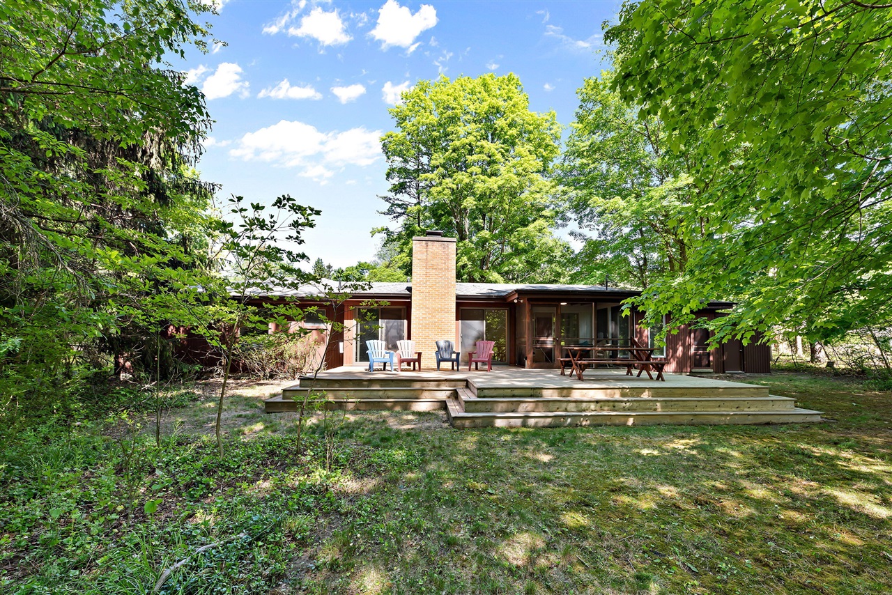 Move-in ready 3br/2ba turnkey ranch home with large yard and screen porch, around the corner from huge private beach in Shorewood Hills! This nicely updated home has hardwood floors throughout! Easy-living floor plan offers a sunny living room with a fireplace that opens to the dining area and a terrific screen porch overlooking the generous back yard. Roomy eat-in kitchen has loads of cabinet space and leads out to dining area too. Primary bedroom has lovely updated en suite bath and additional two bedrooms share a full bath. Enjoy Shorewood Hills 1/2 mile of large private beach, tennis/pickle ball courts and playground. Close to Warren Dunes and downtown Sawyer, with easy access from Chicagoland area. This is a great getaway you'll enjoy in all seasons! Move right in and enjoy!