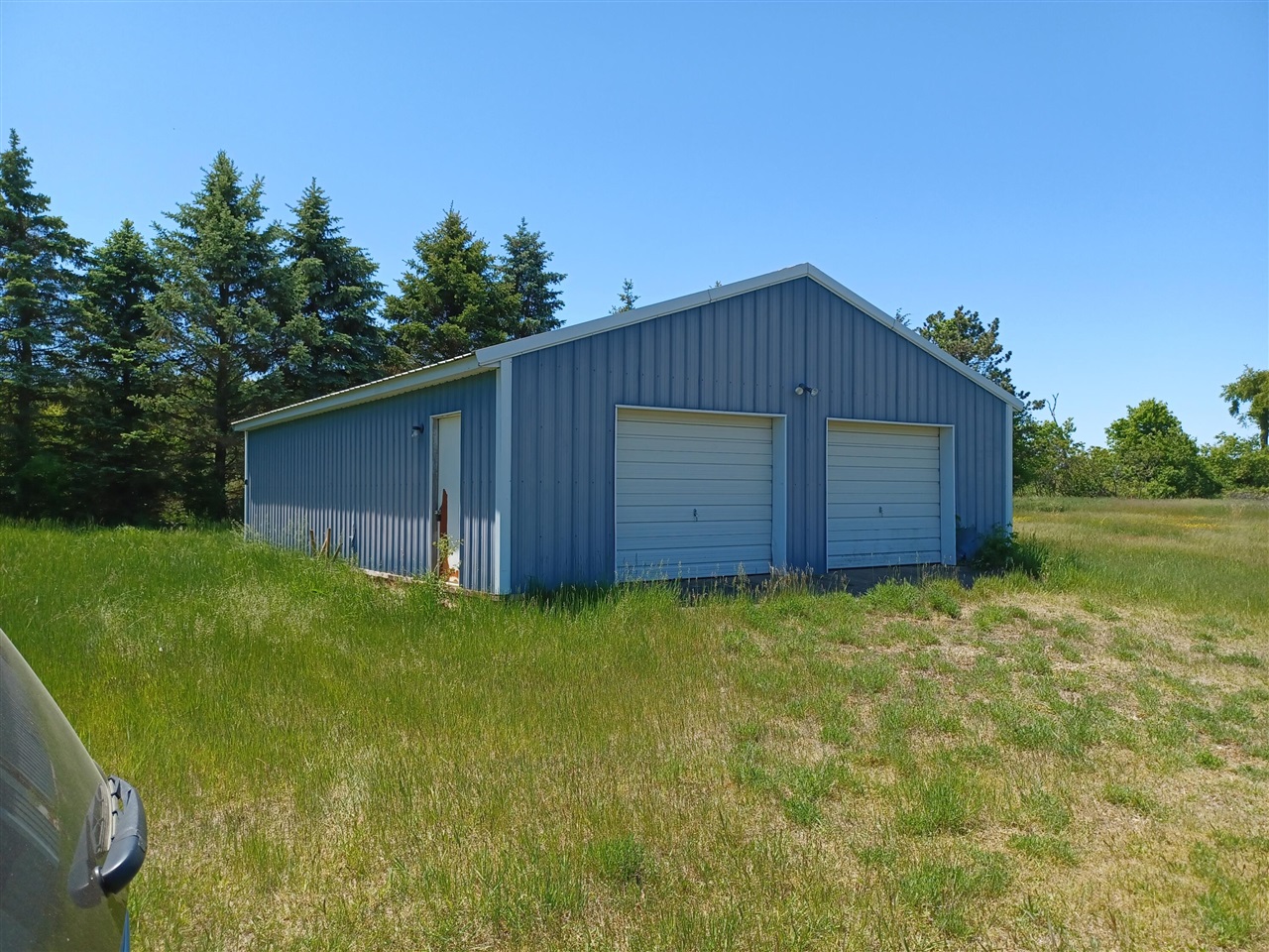 3.24 acres with a 30 x 40 pole barn with concrete floor and electric. Mobile home with 2 Bedrooms & 1 bath that needs some TLC with a well, septic and electric attached.Buyers responsibility to verify working order of well, septic & electric.