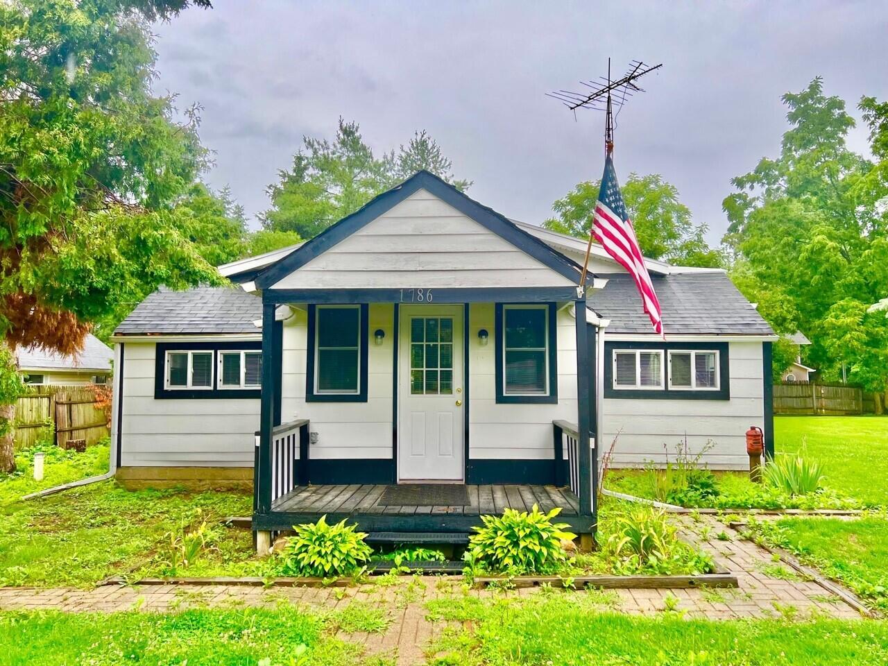 Excellent bungalow home with lots of recent updates. Clean and ready to move in now! Newer furnace, water heater, plumbing, flooring, painting, and more. Vinyl replacement windows, large lot with spacious backyard for the pets and play area for the kids. Also includes heated garage with utilities and a dynamite man cave with separate workshop/garage. This is an affordable home with payments less than many pay for rent! (9250)
