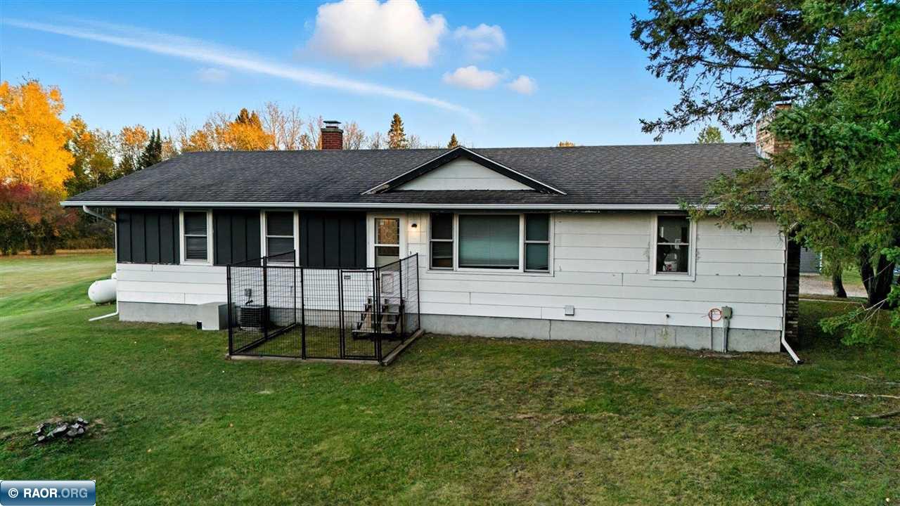 Welcome home to this 3-bedroom rambler in a fantastic location on 4.46 acres! Step inside to a warm and inviting living room featuring a wood-burning fireplace.  The  kitchen offers a gas stove and great flow into the dining area, where a sliding glass door opens to a large deck—perfect for entertaining or relaxing outdoors.  The main level also features an office/den (currently used as a bedroom). The lower level provides abundant storage space. Large newer 30x40 garage offers plenty of room for vehicles, tools, or hobbies.