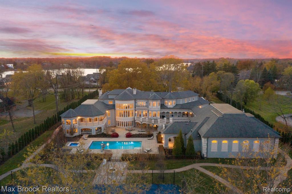 ONE OF A KIND 4 ACRE BLOOMFIELD ESTATE W LOWER LONG LAKE FRONTAGE. OVER 20,000sf OF EXCEPTIONAL LIVING SPACE. SAVANT SMART HOME. COMMAND ENTIRE ESTATE BY PHONE W THE TOUCH OF A FINGER! LUTRON LIGHTING SYSTEMS. VIEWSONIC GROUNDS MONITOR. EXTENSIVELY UPDATED 2017! 2000SF ADD, KITCHENS, BATHRMS, FLOORING, HARDSCAPE & MORE! SPRAWLING GOURMET KITCHEN W NOOK & LOUNGE AREA. 2 LUXURIOUS PRIMARY SUITES, 5 GUEST SUITES. PRIMARY SUITES OFFER DOUBLE W/I CLOSETS, DOUBLE FULL BATHS. FF PRIMARY BOOSTS KITCHEN & LAUNDRY. PERFECT IN-LAW/NANNY QUARTERS! QUALITY FINISHES & DETAIL THROUGHOUT, PREMIUM CUSTOM CABINETRY, CHEF GRADE APPLIANCES & EXQUISITE STAMPED VERSACE TILE. EXCEPTIONAL THEATER ROOM W CUSTOM INTERACTIVE LEATHER SEATING! BASKETBALL COURT W VIEWING AREA & LOCKER RM. WORKOUT AREA W SAUNA/STEAM RM & HOT TUB. NEWLY REFINISHED POOL & JACUZZI W AUTOMATED COVER, REGULATION TENNIS COURT, FIRE FEATURE, MULTIPLE AREAS TO ENTERTAIN! PAVER WALKWAY THAT WINDS THROUGH OUT METICULOUSLY LANDSCAPED GROUNDS!