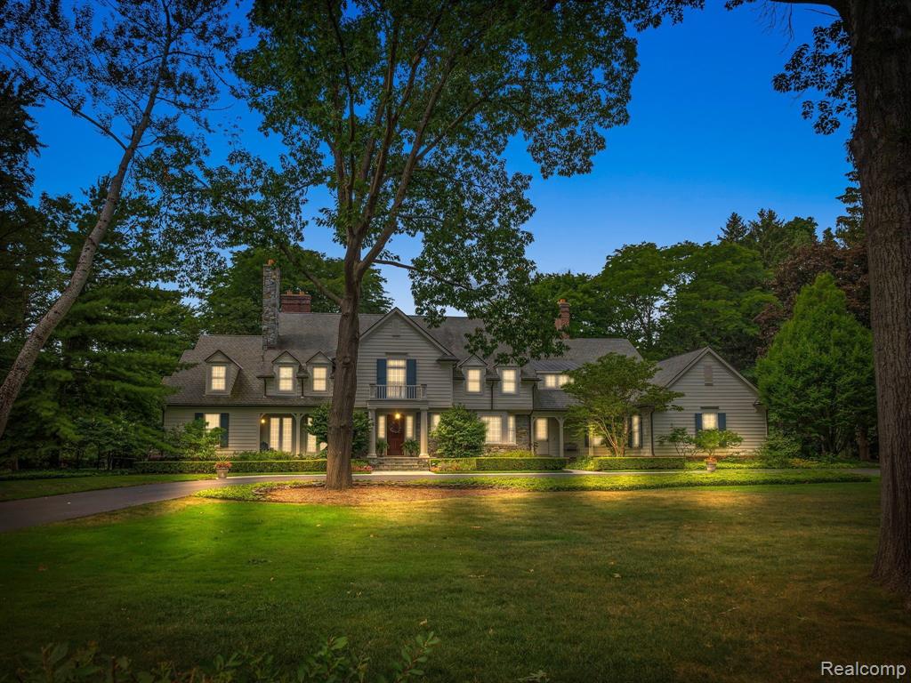 This exceptional custom-built Connecticut style farmhouse is nestled on one of the area's most awe-inspiring ultra-private park-like properties. Each appointment creates an ambiance of comfort and sophistication throughout with windowed walls highlighting radiant-heated hickory floors & custom millwork. The quality of the finishes, selections and materials are unparalleled, and the floor plan is expertly executed throughout with 7 unique natural (or gas) fireplaces throughout. Welcoming 2-story foyer flows into Mahogany office w coffered ceiling, formal living and dining rooms with built ins, spacious island kitchen with top-of-the-line appliances, butler's pantry with wine display, kitchen that opens to 2 story family room. 1st floor Primary Bedroom oasis walks out to the private terrace and boasts a fireplace, spa like marble bath, and massive walk-in closet with wormy chestnut island and second laundry. Retreat upstairs to 4 large ensuite bedrooms all fitted with walk in closets, a flex room loft space, large recreation room rough plumbed to convert to a separate living quarters and potential to finish the vaulted walk-up 3rd level additional space. Finished daylight lower level completed in 2022 offers convenient additional living spaces, with a great room with fireplace feature, work out room, full bath, spacious steam room - and plumbed for bar/kitchen. Relax or entertain any number of guests outside on the charming, covered loggia and bluestone patios, expansive grounds or play a game of tennis, pickleball or basketball on the court, which can be converted to a hockey rink in the winter for year-round enjoyment under the lights. Property has been prepped for a pool and or tennis house. The 5-car radiant heated garage is the perfect home for your everyday ride or treasured classic vehicles. Full house Generator. The ultimate in luxury and location, this 5-star residence on over 3-acres is just minutes from downtown Birmingham, shopping, entertaining, restauran