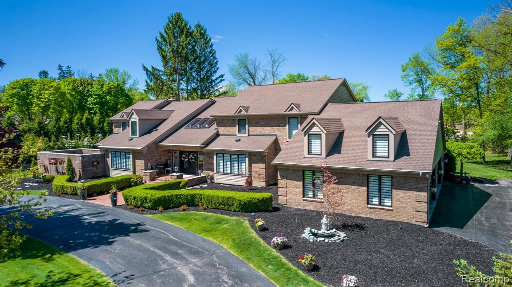 Luxury living at its finest! This custom-built Bloomfield home has been remodeled in 2019 from top to bottom, leaving no detail out. Situated on a private one-acre lot in the prestigious Echo Ridge sub, featuring 6 bedrooms, 6.3 baths, over 10,400 sqft of living space, finished basement w/ a 2nd kitchen, exercise room, home theater w/ surround sound, sauna, attached 4 car heated garage with oversized driveway. Welcoming grand foyer boasts breathtaking details from the crystal chandeliers and floating staircase w/ wrought iron spindles, to the porcelain and hardwood floors, from the gourmet granite kitchen w/ stainless steel appliances, to the first floor master ensuite with his/hers everything and two-door walls that lead to a fully new private Trex deck. Nice size additional 5 bedrooms upstairs. Included are a whole house generator, smart home system, alarm system, heated garage, outdoor speaker system and a private courtyard. All mechanicals have been updated. THIS IS A MUST-SEE!!!