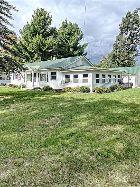 Fabulously maintained 1450 s.f. Ranch style home with 5.5 car garage! 2 bedrooms and 1.5 bath!**This home has so much to offer! It is only 4 blocks from Houghton lake** 2 clean garages 24x24 and 24x20 with separate electrical and work benches**It has a metal roof on both house and garage!**A new Generac whole house generator (2018)**Lennox furnace and Central Air (2013) maintained every year** 7x10 vinyl sided shed with concrete floor**Remodeled kitchen with Hickory cabinets and granite countertop**Updated 1.5 baths the full bath was a 3rd bedroom converted over and is 12x9**A large 15x14 Primary bedroom and additional 10x10 guest room**The 4 season room has endless possibilities to keep as an entertaining space or turn into a sun filled family room :-) All appliances and mounted TV are included! Book your viewing appointment and get into your new home before the winter hits! Immediate occupancy!