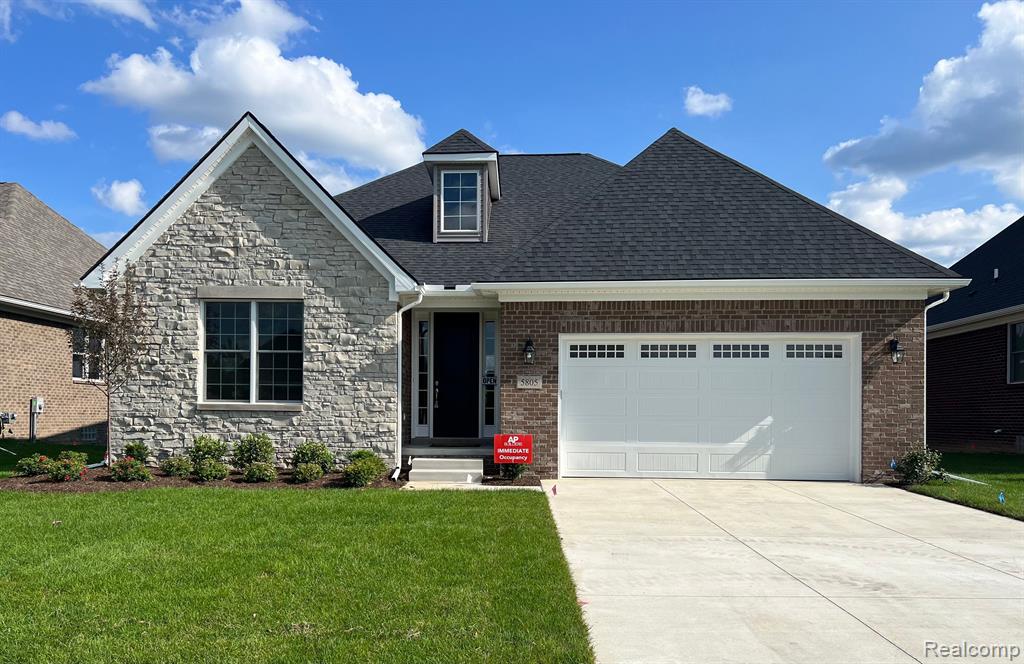Move in 30 days! Pictures are of actual home. Stunning new construction RANCH home. AP Builders is a local Michigan company committed to delivering quality homes. 2020 BUILDER OF THE YEAR! Low maintenance brick and stone exterior, dimensional shingles. Spacious hallway leads to family room, open to kitchen and dining room. Entertain at the oversized KraftMaid island, preparing dinner on your sleek Bosch gourmet appliances and granite ctops. Charming details include 9/10 ft. ceilings, 8ft solid wood door and cased windows. Retreat to the Owner's Suite each evening to watch sunsets through large picturesque windows. SOD, SPRINKLERS, LANDSCAPING and Builder's 1/2/10 WARRANTIES included. Walking trails to Marshbank Park across the street, where water activities abound. Community Close Out Pricing.