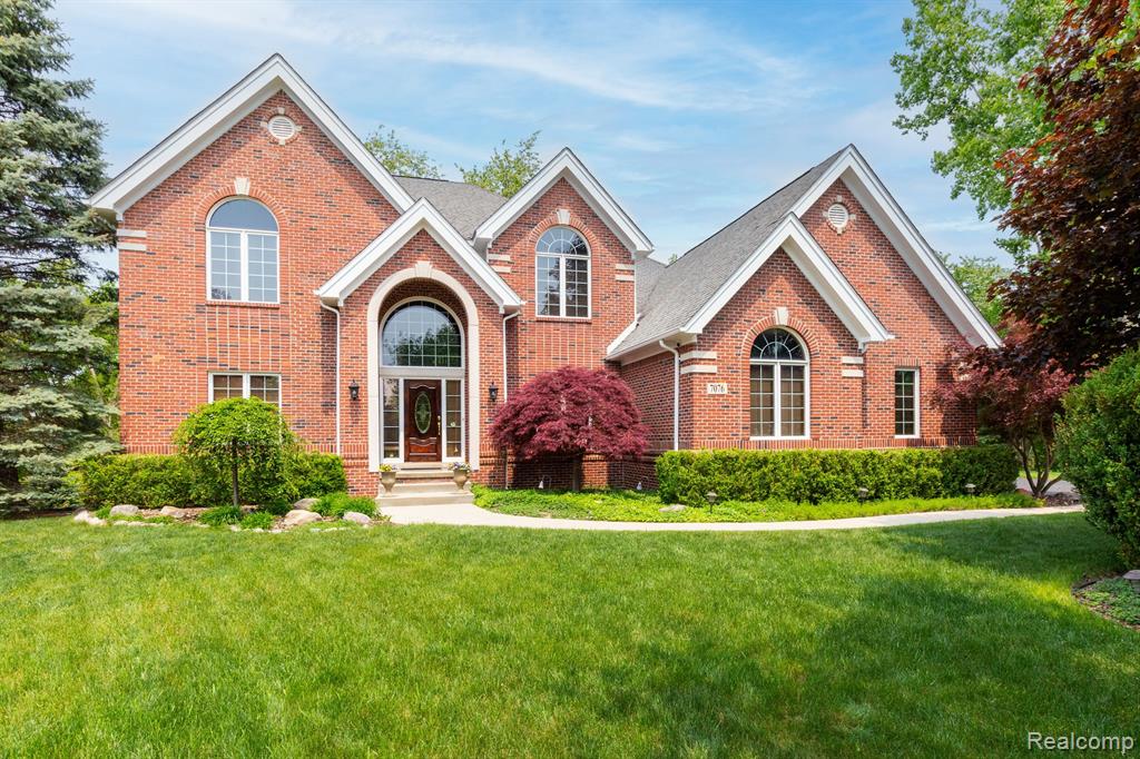 Located in highly desirable West Bloomfield Township, this stunning all-brick home with limestone accents is a true gem. Situated on a premium lot in a peaceful cul-de-sac with paradise oasis surround, it offers a private and spectacular backyard reminiscent of a park, with mature flowering trees and breathtaking wildlife views. Step inside to discover an open and inviting floor plan with 4-inch wide hardwood flooring, porcelain tile, and high-end carpet. The 17-foot high ceiling in the great room, adorned with custom columns, creates a grand ambiance. Enjoy the warmth of the two-way gas fireplace that connects seamlessly with the chef's dream kitchen. The kitchen boasts high studio ceilings, high-end Black Galaxy granite counters, high-quality maple cabinets with roll-out shelves, and a corner double sink with windows overlooking the lush greenery. The spacious master suite is a retreat of its own, featuring 9-foot pan ceilings, a generous walk-in closet, double sinks, a jacuzzi tub, an enclosed shower, and a private restroom with its own window. Entertain and relax on the well-appointed patios off the great room and kitchen, providing ample space for outdoor enjoyment. The finished 3-car garage with cabinets and the large driveway offer convenience and storage options. Additional highlights include full-size 9-foot ceiling daylight basement prepped for finishing, new window glass in 2023, and being a one-owner home! This home is just minutes away from shopping, dining, and entertainment options, with easy access to walking/exercise/bike paths. Conveniently located near M-5, you'll enjoy quick passage to airports, Detroit, Southfield, and other destinations near and far. Embrace the serene lifestyle and make this exquisite West Bloomfield residence your own!