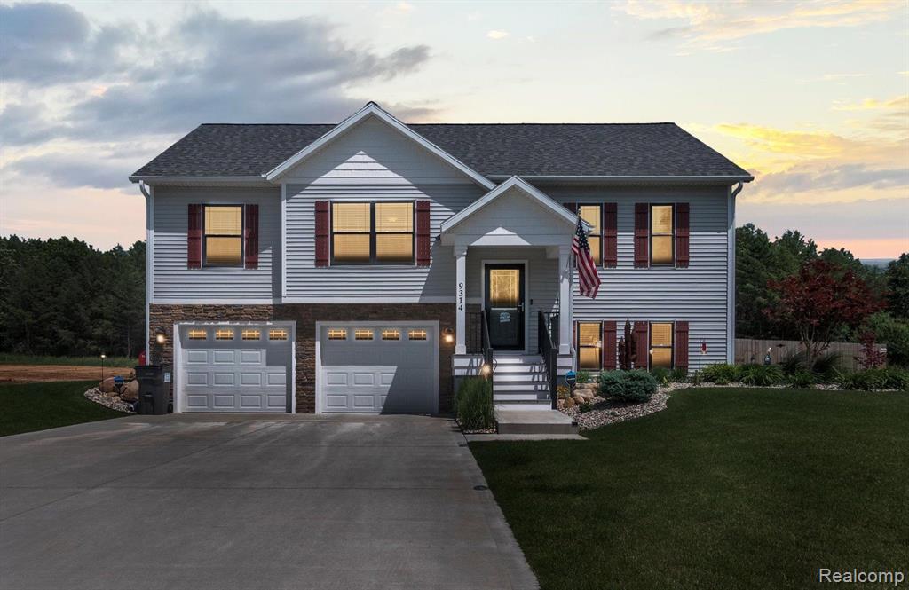 Come home every day to this gorgeous home built in 2019! Better than new w/numerous custom upgrades, this home w/attached 2 car oversized garage has 2058 sqft of living space, 3 bedrooms & 2.5 baths. Sunlight filled, open-concept upper-level features kitchen w/quartz counters, soft-close doors & drawers, pantry, & LG smart appliances package in black stainless steel: 6 burner, two-oven, gas slide-in stove; OTR built-in sensor microwave; InstaView Craft Ice French door refrigerator; & LED interior lit 3 tier smart dishwasher. Convenient main floor laundry equipped w/Samsung smart washer & gas dryer plus shelving for laundry supplies. Desirable split floor plan offers private master retreat w/large walk-in closet & ensuite bath w/granite countertop, his & her sinks, separate shower, & relaxing soaking tub. Custom features & recent upgrades include new home office suite w/half bath & walk-in closet for additional storage; custom paint throughout home; custom molding in great room & mirror framing in both bathrooms; custom Levolor blinds throughout; full view glass entrance door w/retractable screen; recently updated luxury vinyl flooring in all bedrooms & closets; soft close doors/drawers in all baths; plus, never be in the dark again w/a Generac whole house gas generator (2021). Enjoy stunning wooded nature views off the back deck & fully fenced yard w/ 6â€™ privacy fencing down both sides & 4â€™ black chain link at the back showcasing amazing views of this private backyard oasis. 2 gates allow easy access to the backyard from each side of the house, and a back gate to access firepit, shed, & walking trails behind property. Other outdoor upgrades include a 7 zone irrigation system; new concrete under deck for additional entertaining space; Amish 8 x 10 storage shed on concrete slab (2022); full house gutters (2021); & new landscaping (2022). Located only 1\4 mile from the desirable Montague High School, Middle School & Elementary. Donâ€™t miss out on a rare opportunit