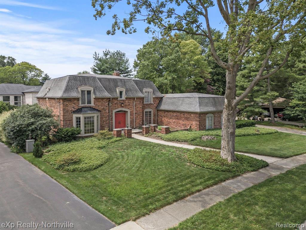 This GRANDIOSE brick colonial, methodically designed and constructed by the highly coveted LOCAL LEGEND, Edward J. Russell Jr., offers an incredibly unique opportunity to live in the EXCLUSIVE Village of Grosse Pointe Shores. The GATED, RESIDENTS ONLY community park rivals the most distinguished country clubs in the state. Amongst the sprawling, perfectly manicured grounds youâ€™ll find new tennis courts, a community pool, basketball court, an impressive marina, and more. Additional community features include a public library, residents only dog park, award winning public and private schools, and a premier equestrian facility. The tasteful updates and the fluidity in the layout of this home cannot be overstated. Upon entry, youâ€™re greeted by a stately foyer with marble floors and an elegant, curved staircase. The first-floor features two conveniently located half baths, a sizeable laundry room, and a palatial library, providing convenient access with a secluded feel. The immaculately updated kitchen offers extensive counterspace, and is complete with a STUNNING double-sided fireplace, marrying the kitchen with the vast yet warm family room. The tranquil sunroom provides year-round enjoyment. The formal dining room seamlessly blends into the elegant sitting room, together creating the perfect environment for hosting. The entire home features a plethora of sizable windows, allowing natural sunlight to flood each room. The freshly painted second-floor primary suite features a large bedroom, an impressive full bath (skylight), and an expansive walk in closet. An additional second floor suite offers a large bedroom, two closets, and a substantial full bath with access through the bedroom and the hall. Two additional generously sized bedrooms, each with their own closets, complete the meticulously laid out second floor. Be a part of THE most exclusive community in Michigan. BTVAI.