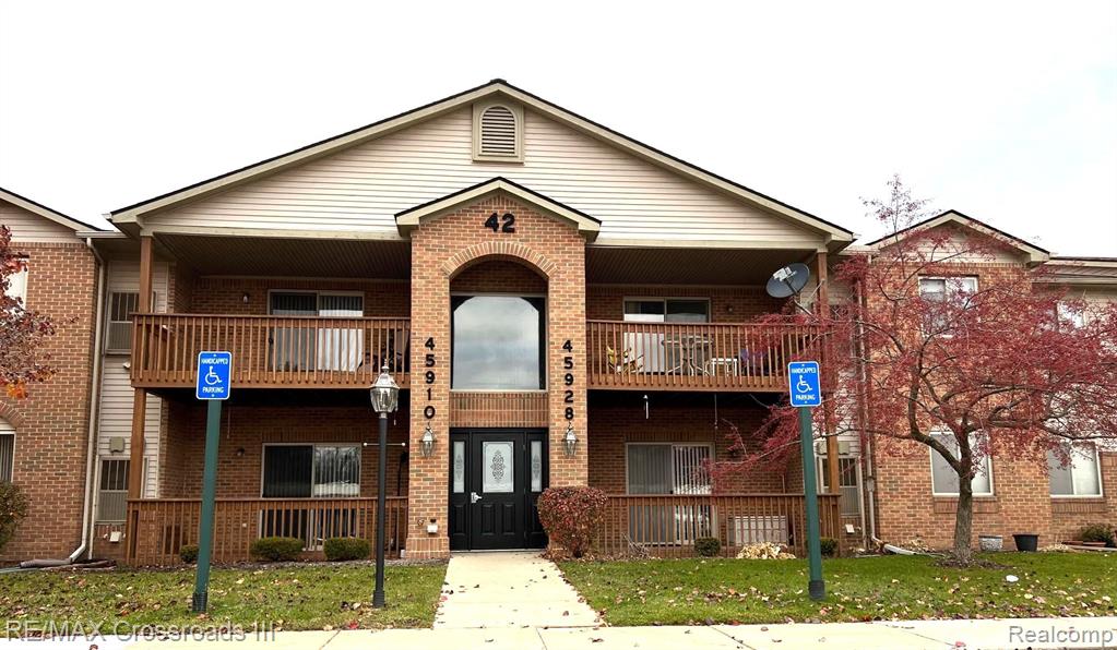 Immaculately kept First floor condo with 2 bedrooms and 2 full baths. Some Newer Carpet and wood flooring, newer refrigerator plus In-unit laundry room. Spacious living area with lots of storage space with doorwall leading to a covered deck. Clean and Neat - Just Move Right In.