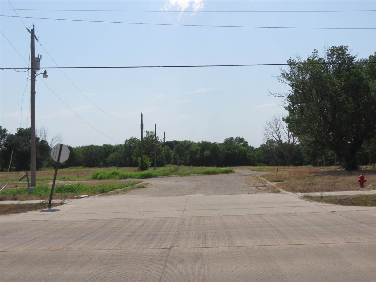 6.25 acres m/l of prime land with Frontage along Jardot Rd. Jardot has been recently paved & improved. City utilities available nearby. Prospective buyers should satisfy themselves of adequacy of utility service and suitability for development. 7th street & Payne streets are platted but not open. Contact listing agent for additional information. Drive by or walk over to view.