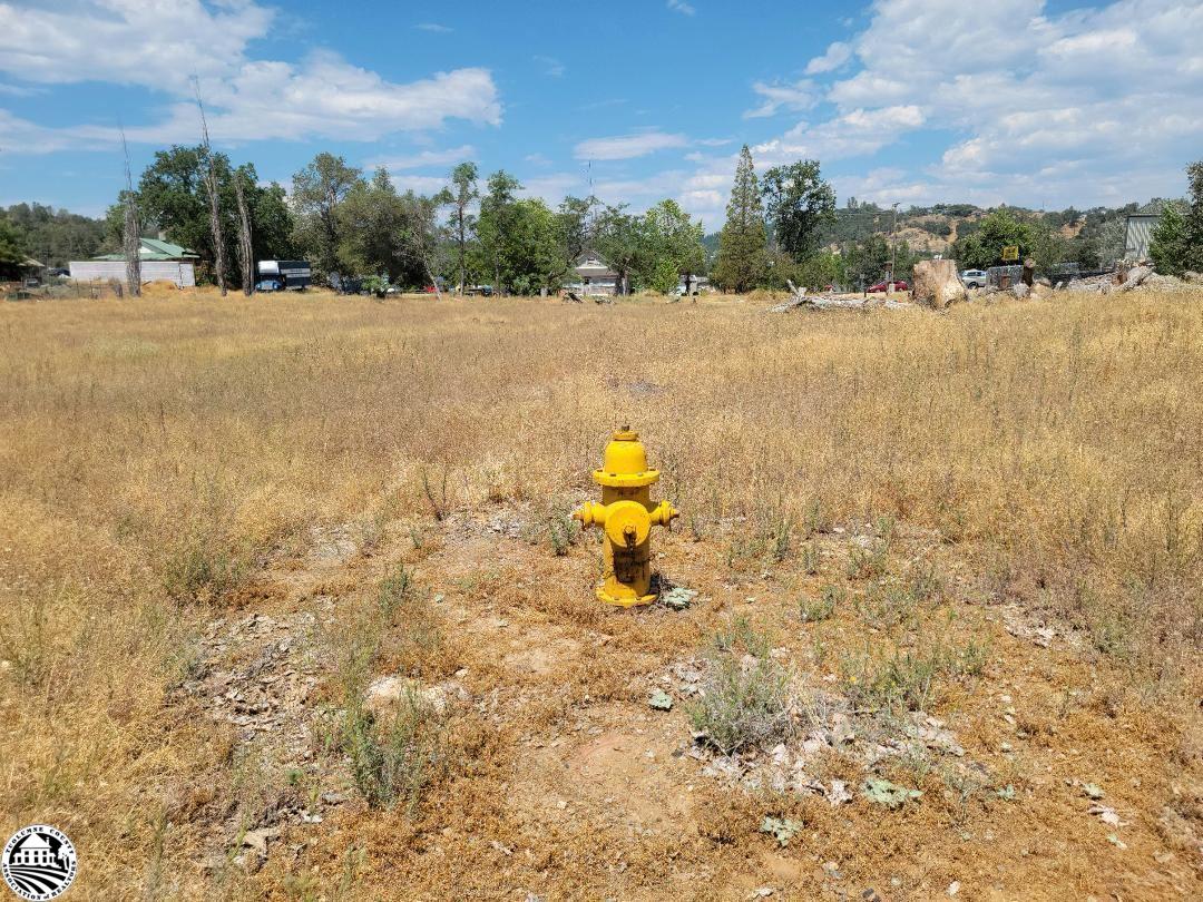 Two parcels with total level buildable site of 1.35 acres. Zoned heavy commercial C-2 zoning. For sale, for lease, or build to suit. Public utilities at site. Possible owner financing and will consider selling lots individually.