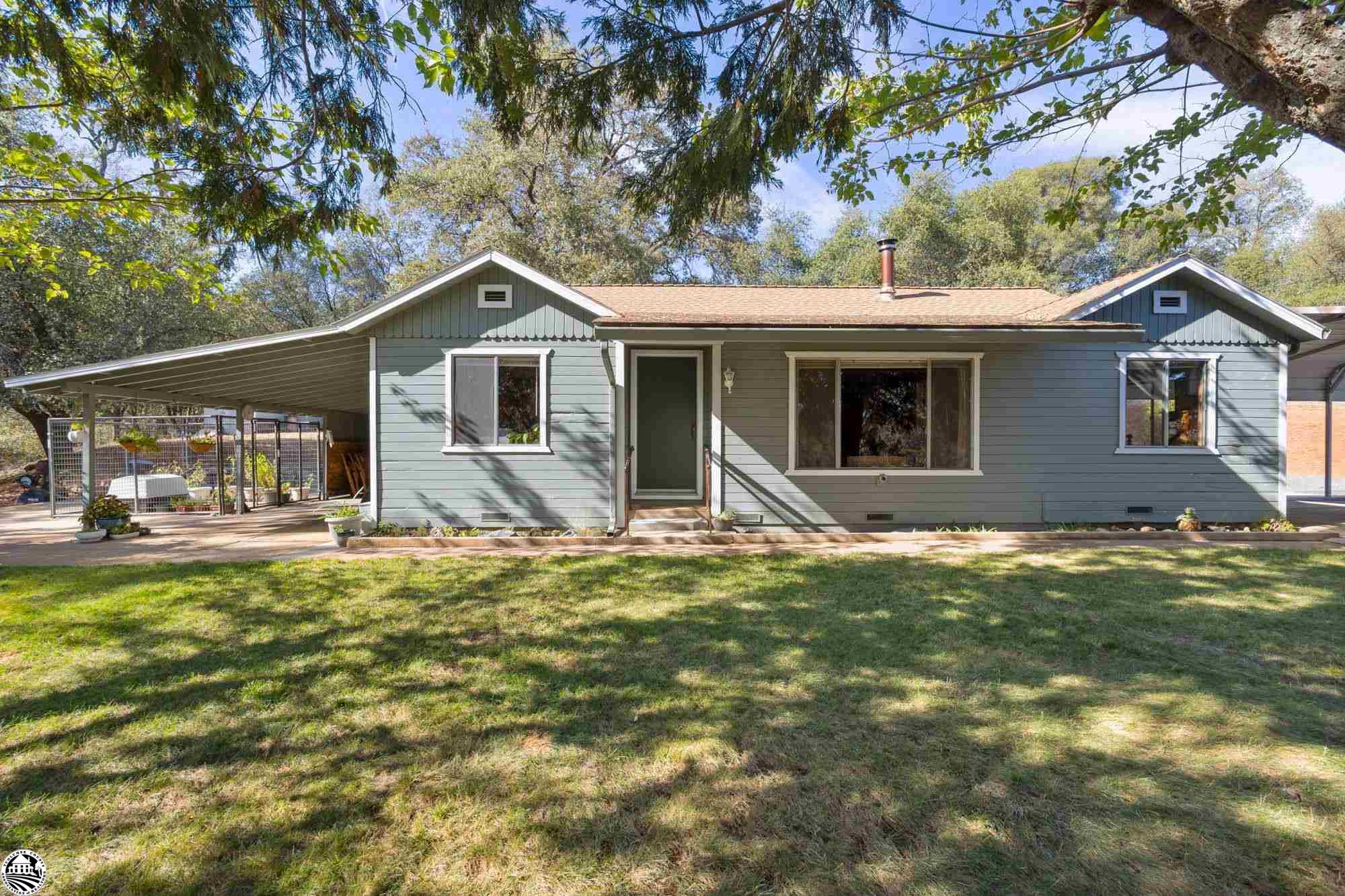 Take a look at this beautifully maintained 1 level home! Great location with easy access to HWY 108, shopping, and local entertainment. Sitting on a 1.67 acre lot and with 1200 sq. ft. this home has so much to offer! Easily entertain on the spacious concrete patio perfect for parties and events! Inside you’ll find 3 carpeted bedrooms and 1 bath with a single vanity, shower and tub, and storage! The large window in the living room allows for plenty of natural light showcasing the free-standing fireplace and the open-concept room. The kitchen features plenty of storage and space to gather and cook with loved ones. This home is one level. Outside you’ll find plenty of parking for guests or RVs with a large carport in the driveway. There are 2 large storage buildings on the property. Enjoy the serenity of living in the mountains out on your back patio! Pick up where the landscaper left off and create your dream yard! Don’t delay, call today for a private showing!