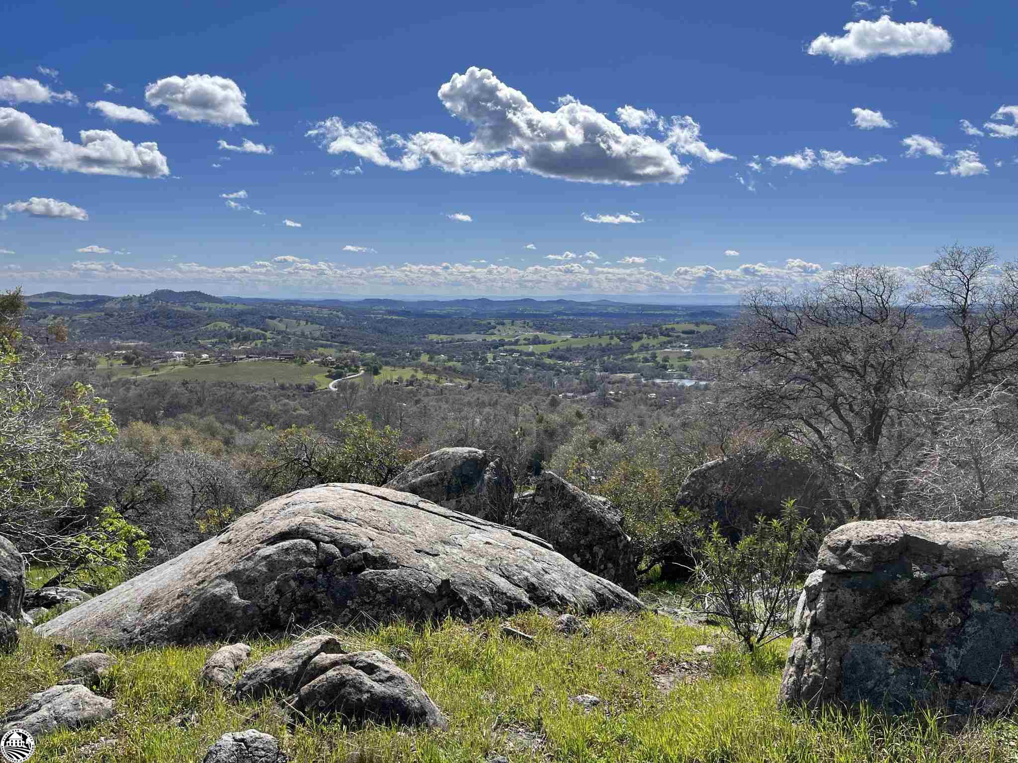 This stunning 3.69 acre lot is the perfect place to build your dream home. Located in Lambert Lakes, Tuolumne County's premier upscale neighborhood. With its breathtaking views you can see for miles towards the central valley and south to the Sierra Nevada Mountains. The lot is gently sloped making a great building site for your dream home with additional room to fit your needs. Granite boulders add to this lot's natural beauty creating a unique outdoor setting. District water and power are ready for hookup. Don't miss out on the last lot in Lambert Lakes. See it today!