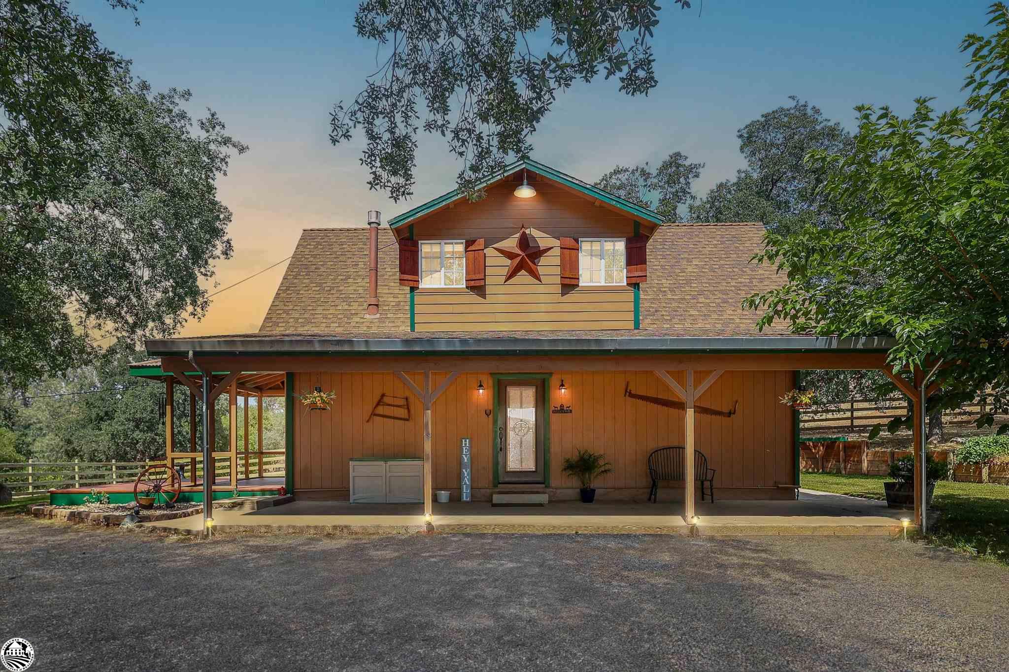 Here is your opportunity to own and live at a horse ranchette. Hold on to your spurs as this property is set up for a move-in ready ranchette.  The horses have a four-stall Behlen Mare Motel with attached tack and feed room. On the side of the Behlen Mare Hotel is a MD Barn Master wash station. On the 4.68 acres there are three more out buildings and a single family residence. The other buildings include an extra large carport (22’W x 25’L x 12’ high), a shop that can be converted to a guest quarters, and a storage shed. Furthermore, the acreage is currently split into three sections in order to have different breeds of animals or 4H projects. The property is fenced and cross fenced with non-climbing fencing to ensure the safety of your animals.  After a hard day's work on the ranch, you can retire to a beautiful home. This three bedroom, one bathroom farmhouse has been tastefully upgraded throughout. The kitchen has beautiful granite countertops, stainless steel appliances, and a great view from the sink. A Vermont casting wood stove will keep you warm in the winter and an evaporative cooler will keep you cool in the summer. Furthermore, the first floor has engineered hardwood that is simply stunning. The updated windows allow tons of light in and you have great views from every window. The remaining two bedrooms are upstairs with a spiral staircase to lead you up. In addition, new vinyl plank flooring has been installed on the second floor.  The house is on a well with a commercial built 3,500 gallon water storage tank. Outside the home there is new siding and a fresh coat of paint. This one-of-a-kind horse ranchette is waiting for its new owner. Please call and make an appointment today.