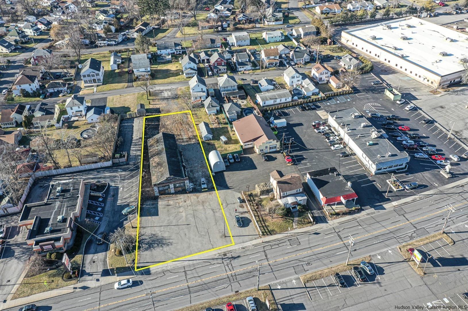 For Lease, (Lease asking $6,000 a month). 90 feet of road frontage. High traffic location on busy Albany Ave in Kingston (23,294 vehicles per day) The property measures 90 x 205 ft and features a 3,710 SF building. Flexible Highway Commercial zoning allows for most any use with plenty of parking. This building has 14 foot ceilings and would be great for a mechanics shop, fabrication, detailing, storage, etc. This property can be built out to desired specs offering a minimum of 1,500 sqft with store front at $3,500 per month. There may be some flexibility in the lease agreement depending on build out. Currently used as storage.
