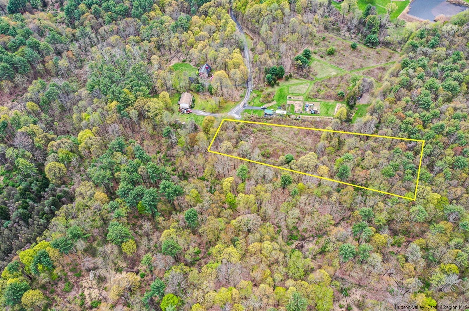 Beautiful 5.2 Acre lot on a quiet dead end road located in the town of Saugerties. Zoned MDR – allows for 1 acre minimum to build. Multiple areas to build here. Close to Woodstock & Catskill.